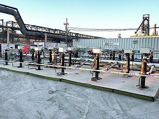 Detail of the gas-powered burners with extraction devices.