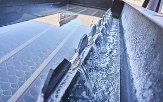 Close-up of the draining clear water at the lamella separator