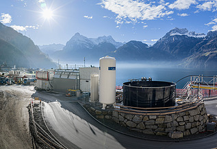 A picture of the tunnel water treatment plant, with Lake Lucerne in the background