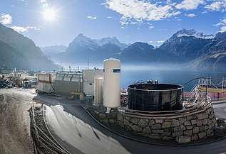 A picture of the tunnel water treatment plant, with Lake Lucerne in the background